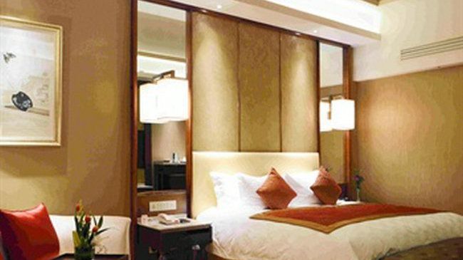 Luxury Blue Horizon Hotel Dongying Quarto foto